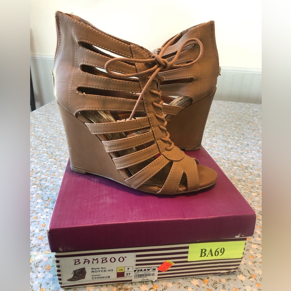 Wedge heels Brand is Bamboo 7 Gently used with a little wear in great condition
